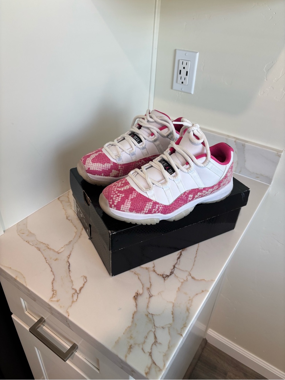 Women’s Air Jordan 11 Retro Low Pink Snakeskin Sneakers
